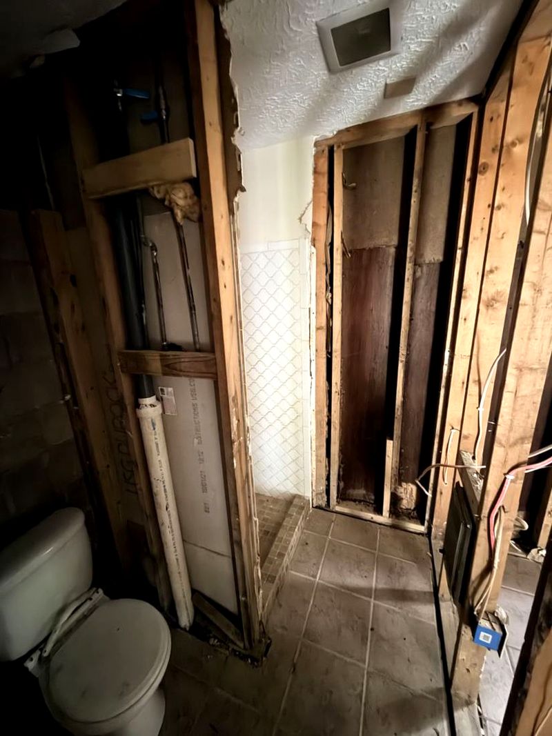 Upstairs bathroom opened to the studs